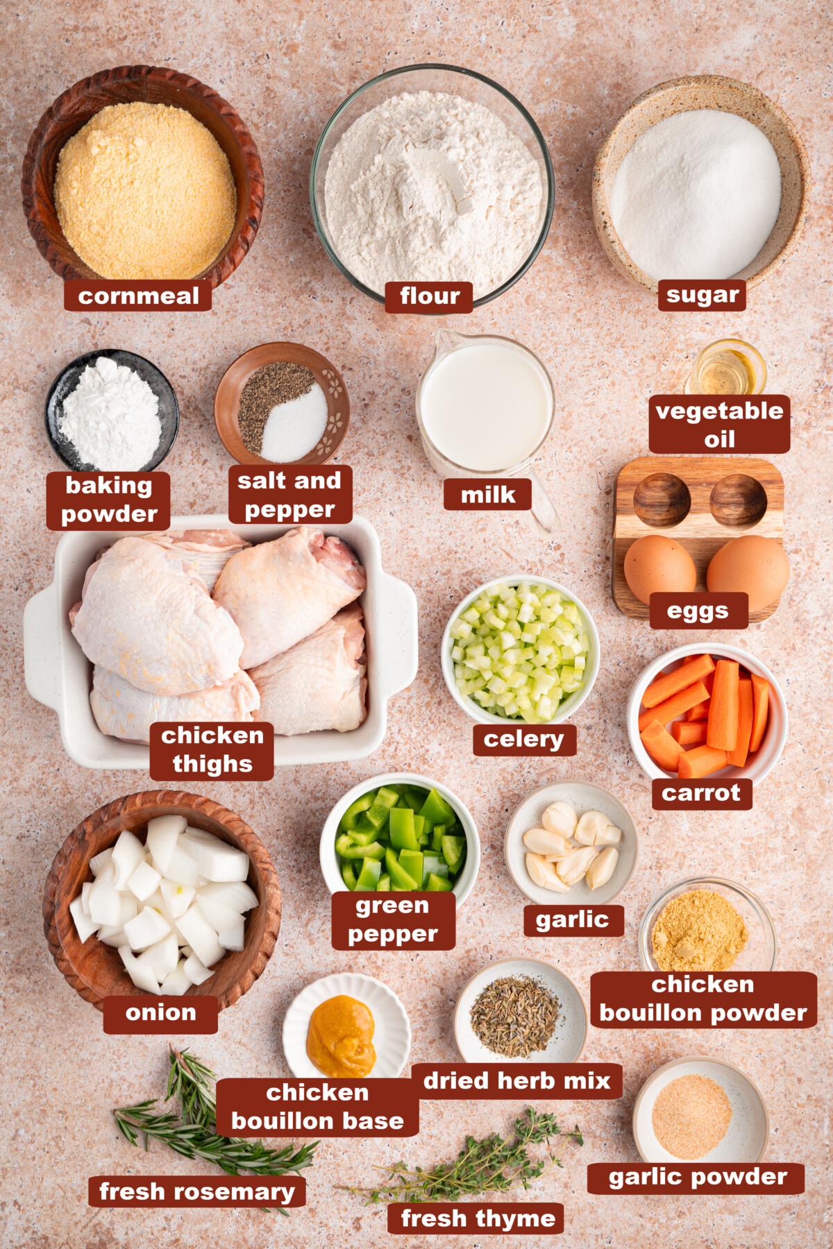 All of the ingredients to make the cornbread and chicken broth for the cornbread dressing in bowls on a countertop.