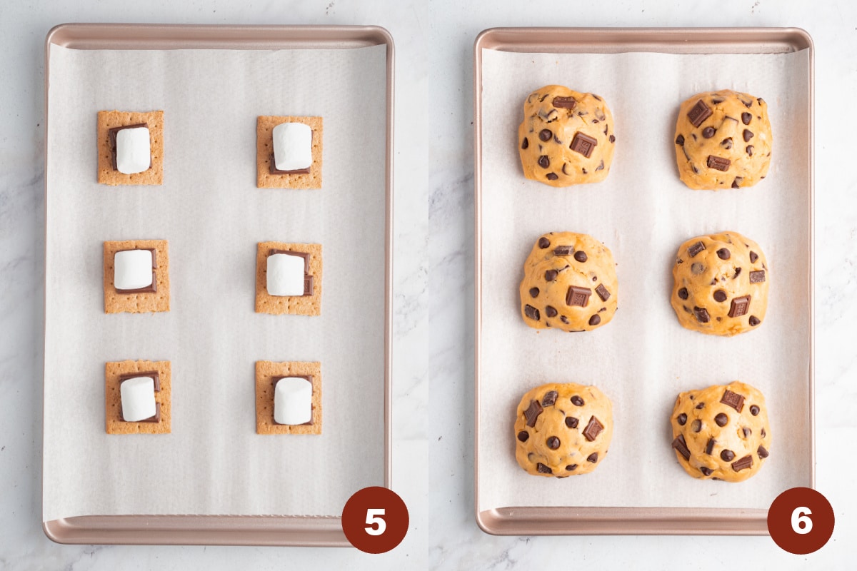 Fix graham crackers are spaced on a lined baking sheet. A piece of a chocolate bar and a large marshmallow sits on top of the graham crackers. Then the cookie batter is piled on top.