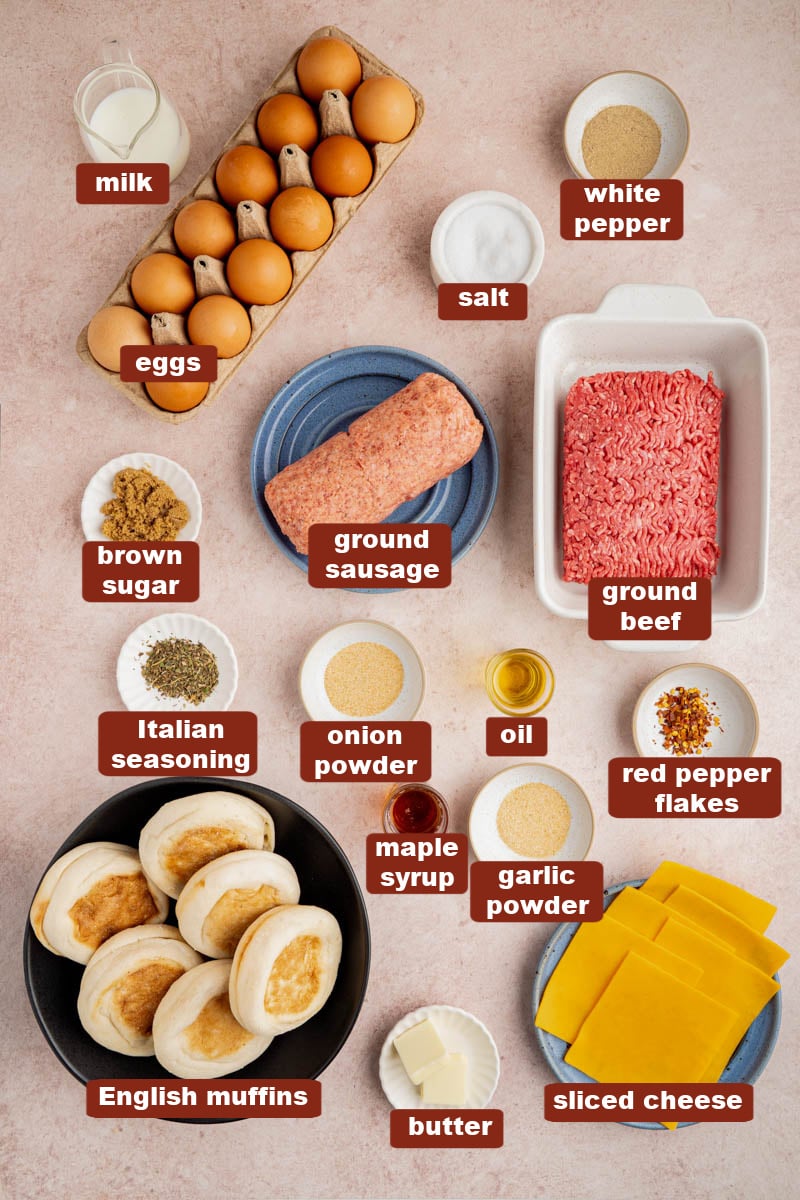 All of the ingredients for freezer breakfast sandwiches in bowls or plates on a countertop.