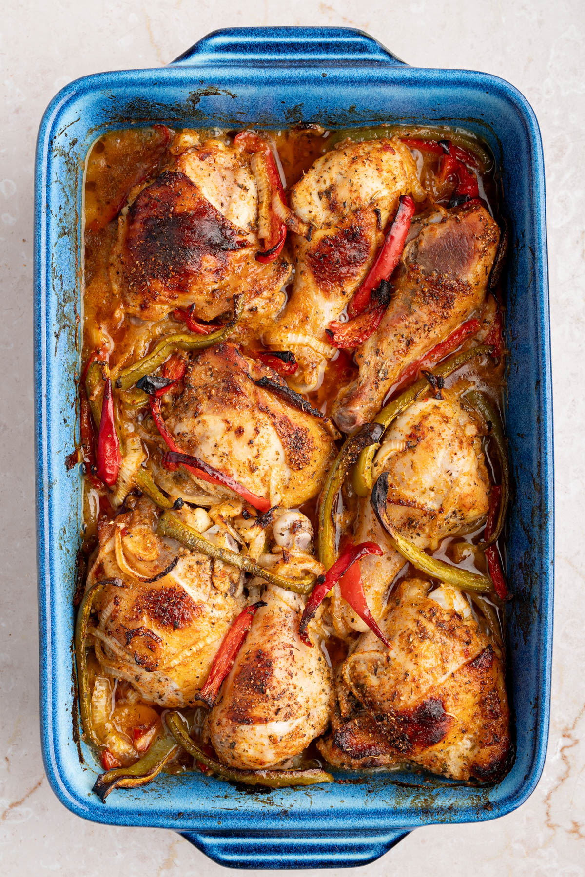 The chicken and italian sauce in the baking dish after coming out of the oven.