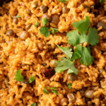 Arroz con gandules (puerto rican rice with pigeon peas) in a serving dish for serving.