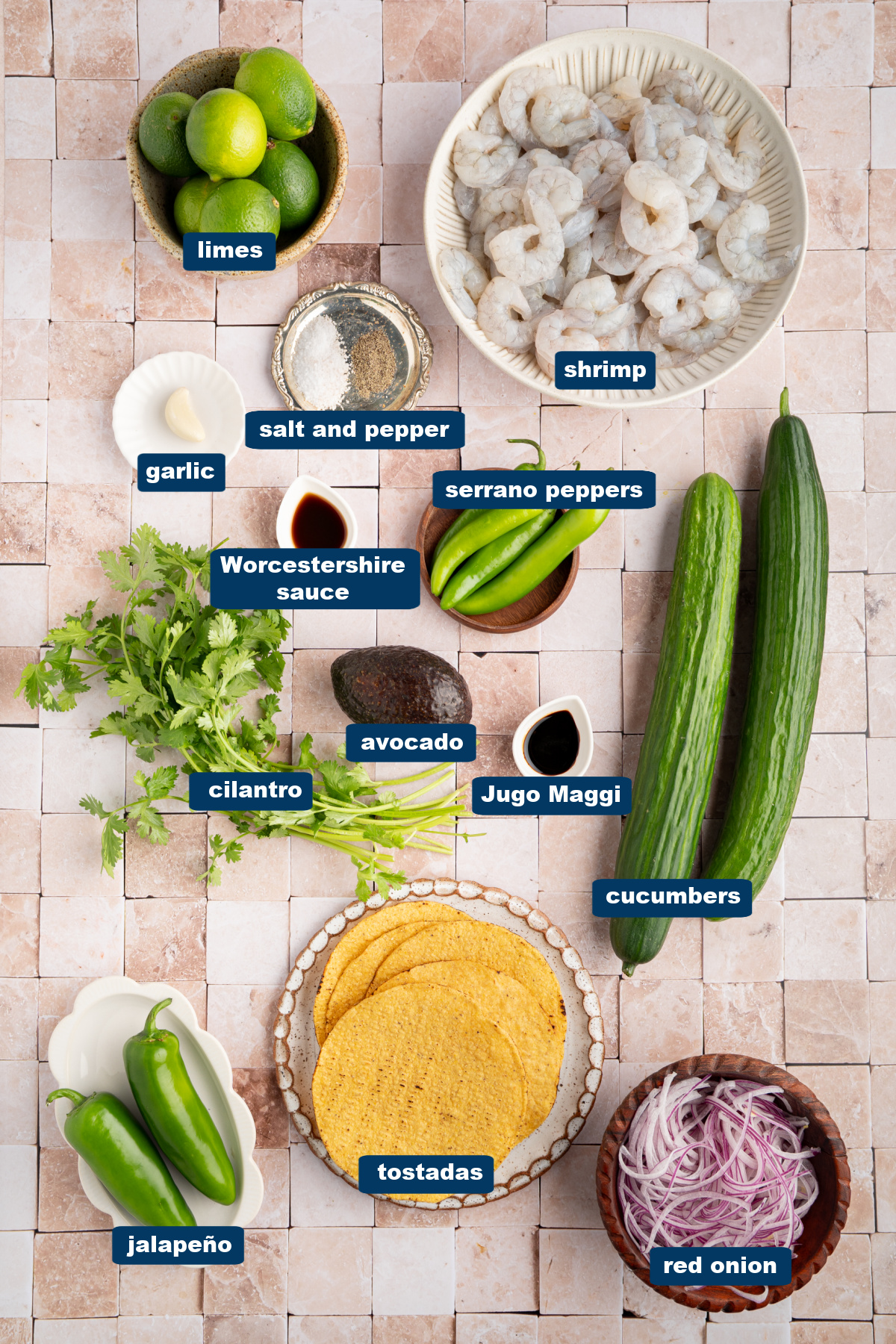All of the ingredients for Aguachile in bowls on countertop.
