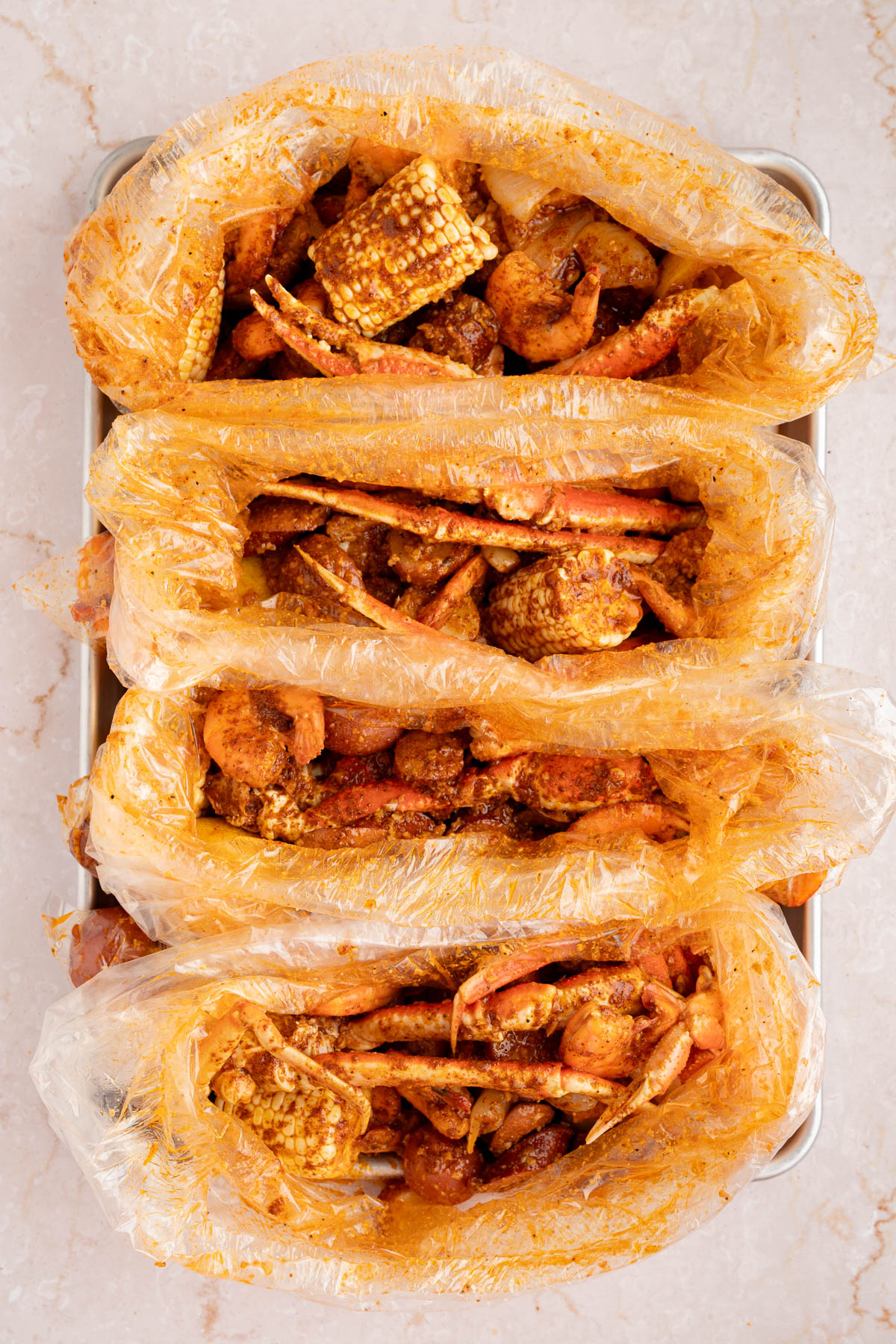 The seafood boil in the bags after mixing everything together.