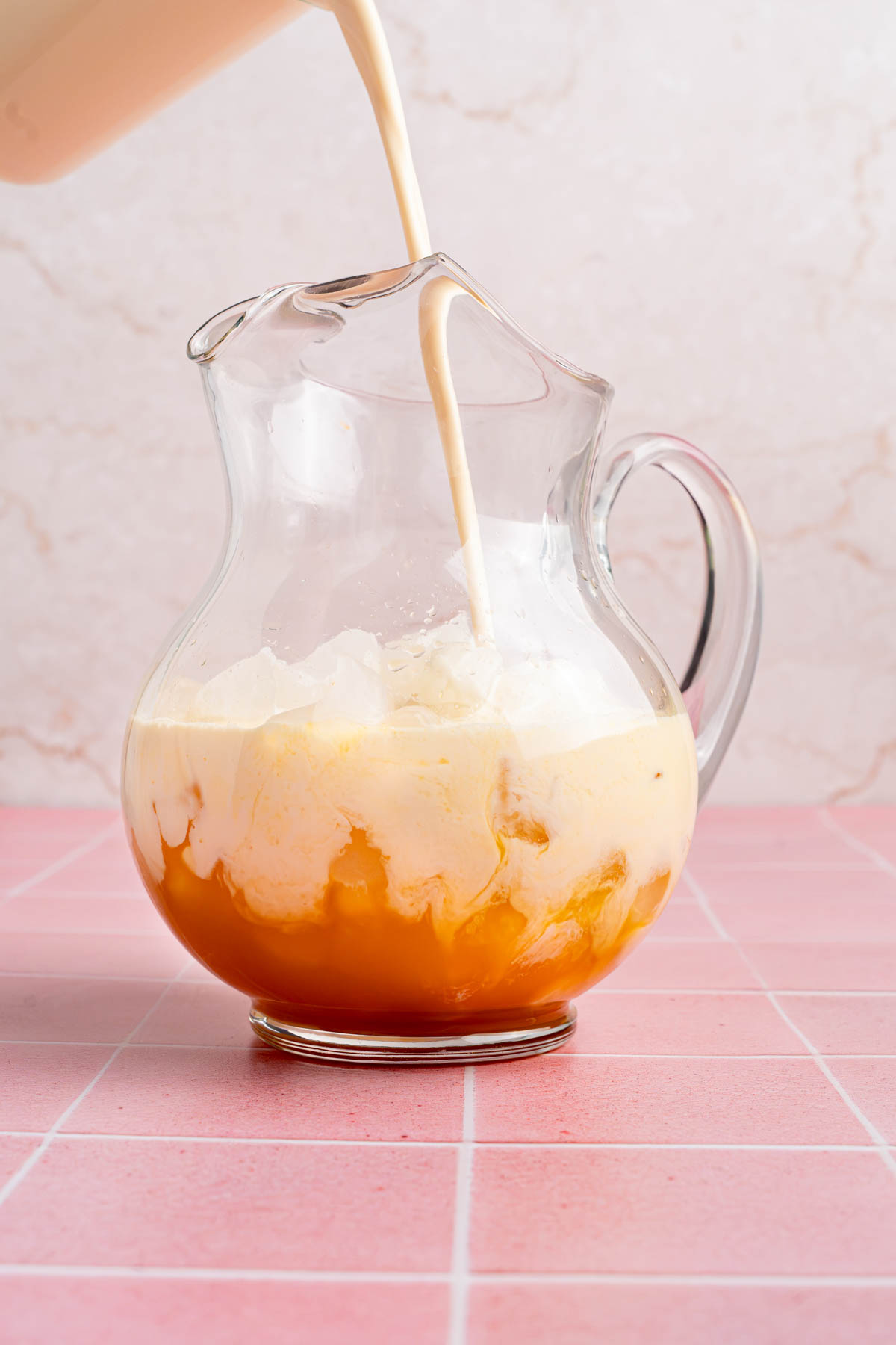 The ingredients in the pitcher before stirring and adding ice.
