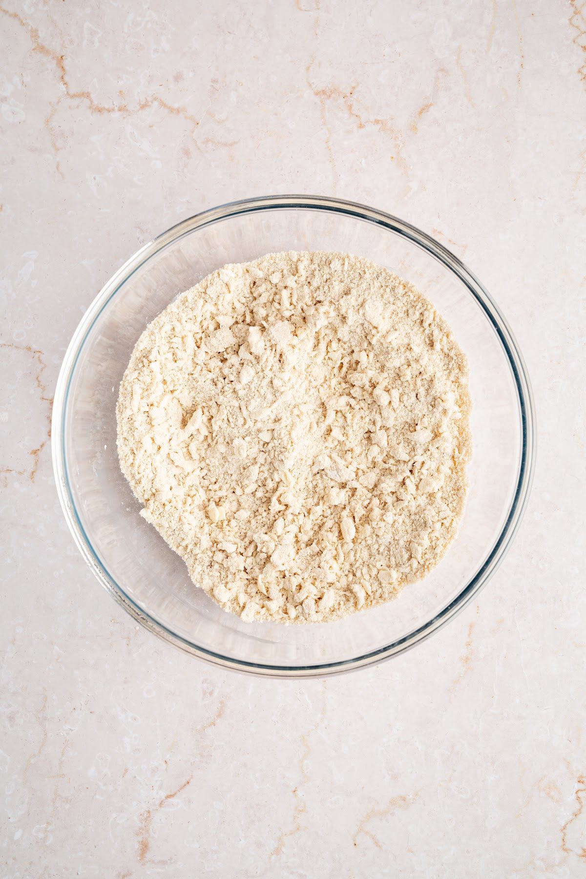 Butter cut into the dry ingredients until the mixture looks like coarse crumbs