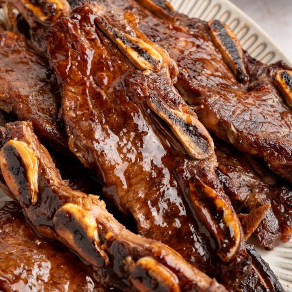 Caramelized Korean short ribs arranged on a serving platter