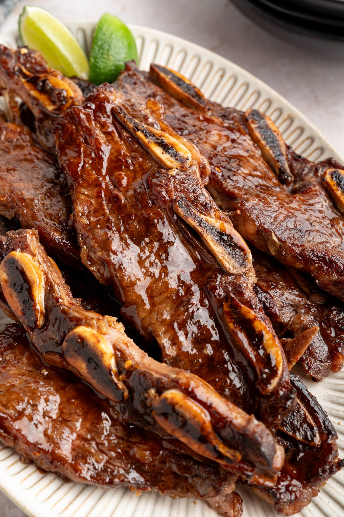 Caramelized Korean short ribs arranged on a serving platter