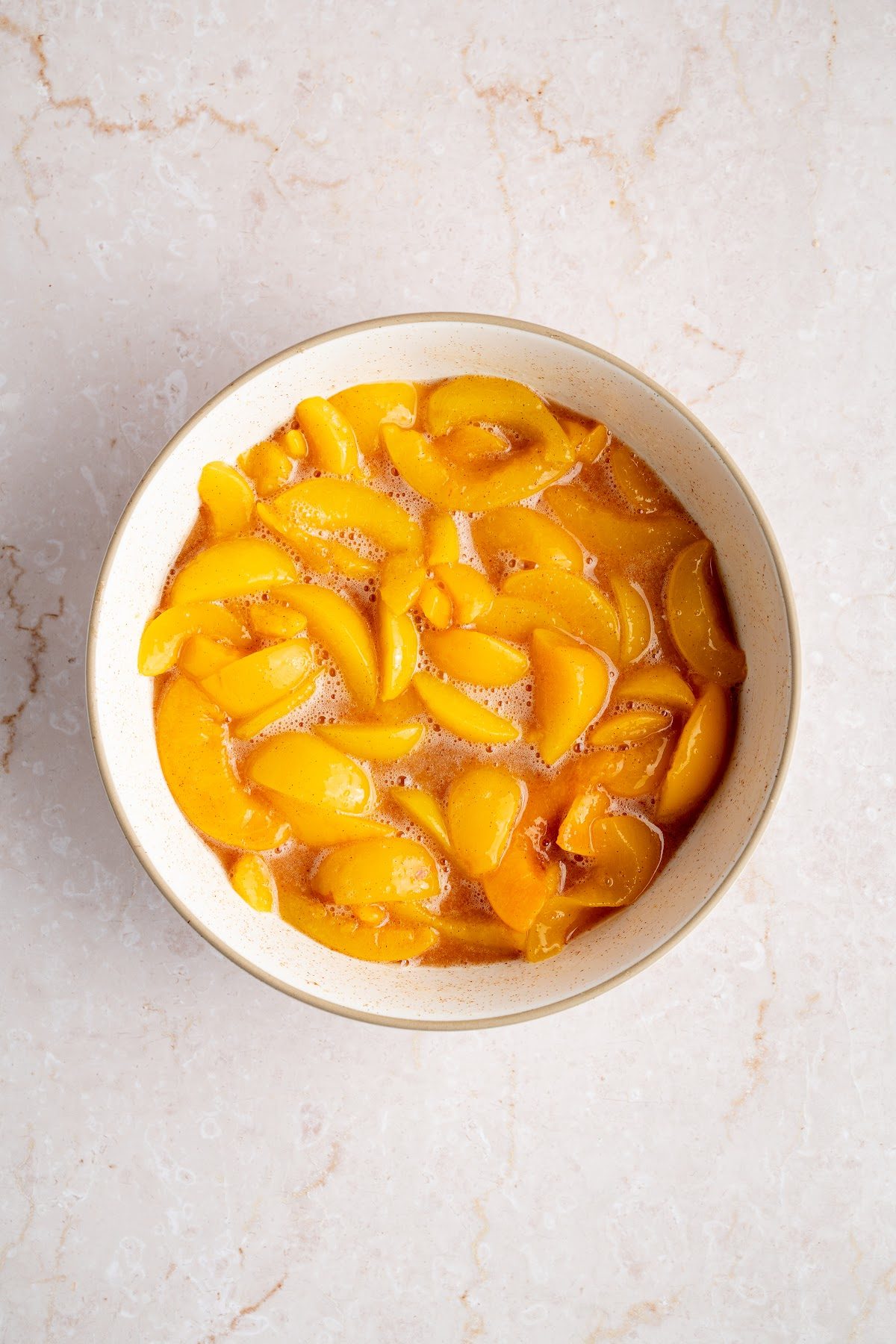Sliced canned peaches stirred with sugar, cinnamon and a cornstarch slurry until the filling is thick and glossy